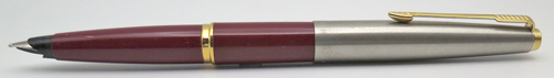 ITEM #6650 6651: PARKER 45 FOUNTAIN PEN IN BURGUNDAY. NOS. NIB IS OCTANIUM IN BROAD. Found in Susan Wirth's basement. Comes with Parker piston converter.